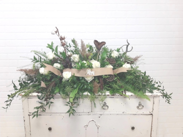 White and Natural Crescent Style Casket Spray